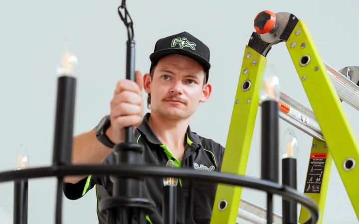 Electrician preparing a pendant fitting